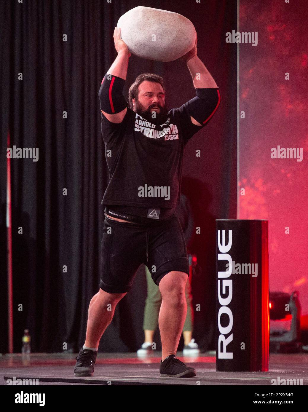 Columbus, Ohio, United States. 4th Mar, 2023. Tom Evans (USA) throws the stone 10 feet, 7 inches in the Steinstossen Stone Throw at the Arnold Strongman Classic in Columbus, Ohio. Credit: Brent Clark/Alamy Live News Stock Photo