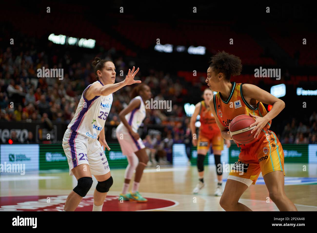 Andela Delic of CDB Clarinos Tenerife (L) and Cierra Burdick of Valencia  Basket (R) in action during the J24 Liga Femenina Endesa on March 4, 2023  at Fuente de San Luis Sport