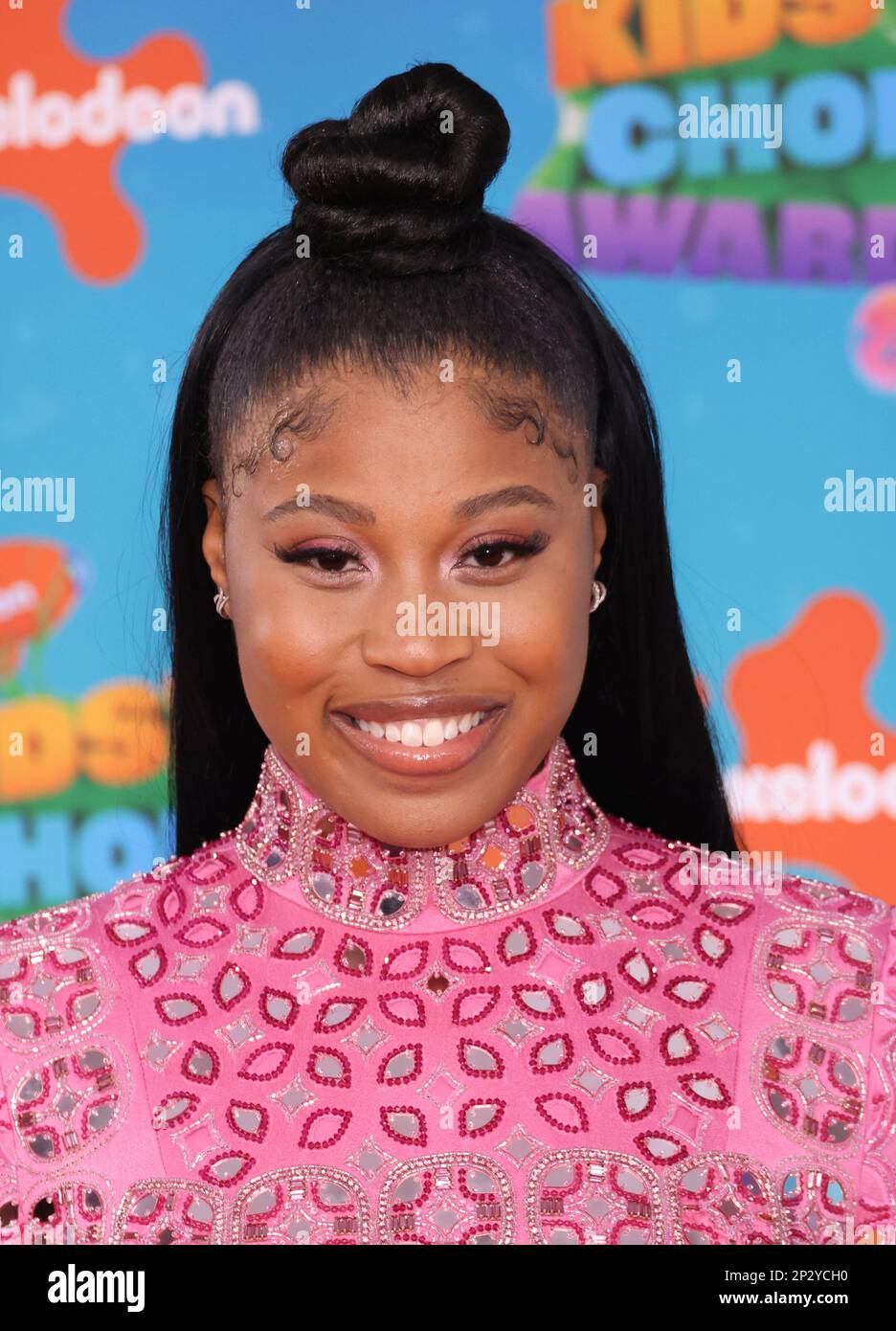 Dominique Fishback arrives at the Nickelodeon Kids' Choice Awards on