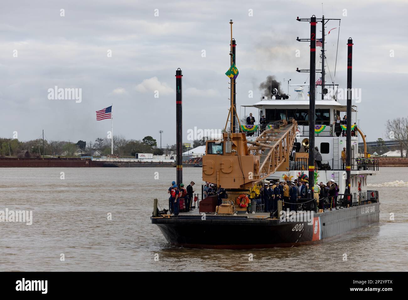The USCGC Pamlico (WLIC–800) arrives in downtown New Orleans, carrying King Zulu and company, Feb. 20, 2023. It is a Lundi Gras tradition for King Rex and King Zulu to arrive by ship to the riverfront to ring in festivities before their respective parades on Mardi Gras Day. Stock Photo