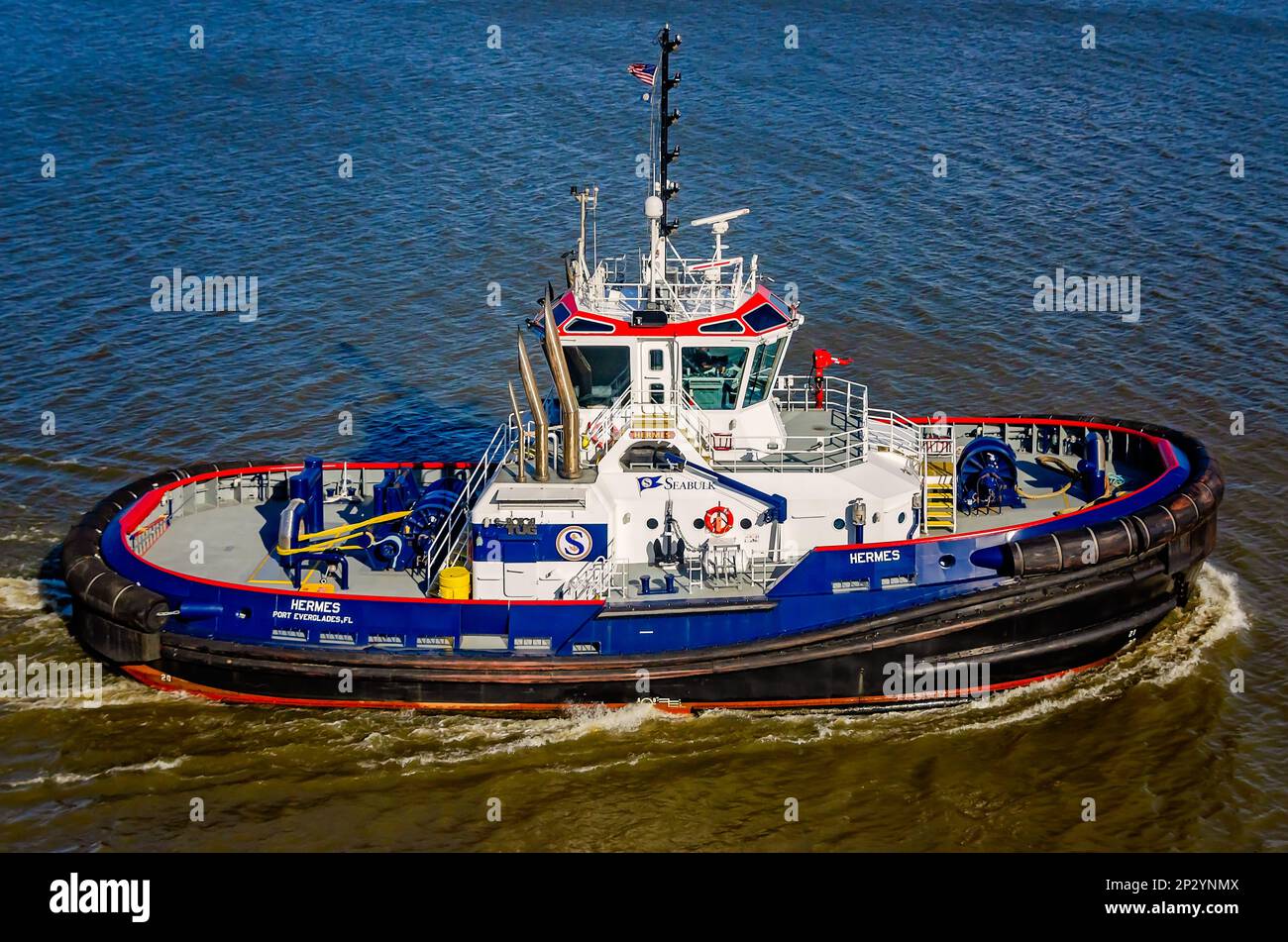 Hermes, a Rotortug tugboat owned by Seabulk Towing, travels along the Mobile River near the Port of Mobile, March 4, 2023, in Mobile, Alabama. Stock Photo