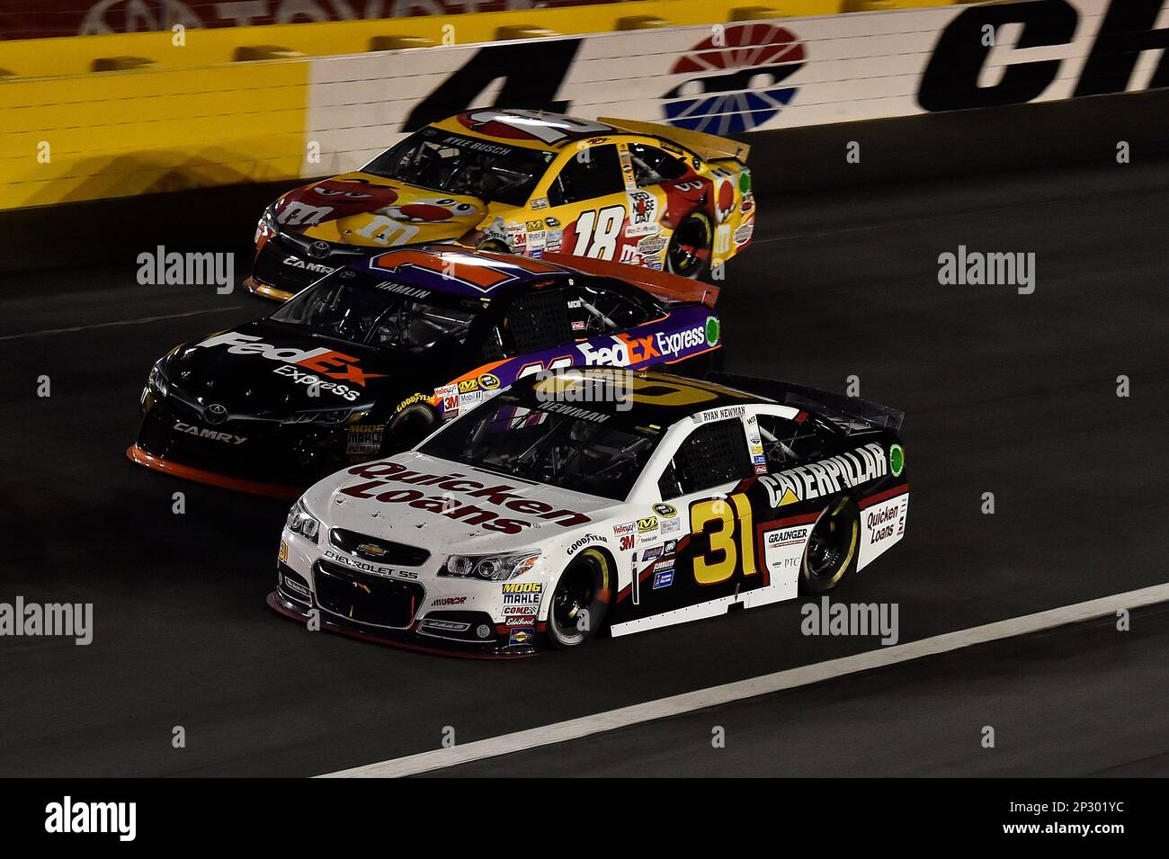 Ryan Newman (31) races with Denny Hamlin, FedEx Express Toyota Camry ...