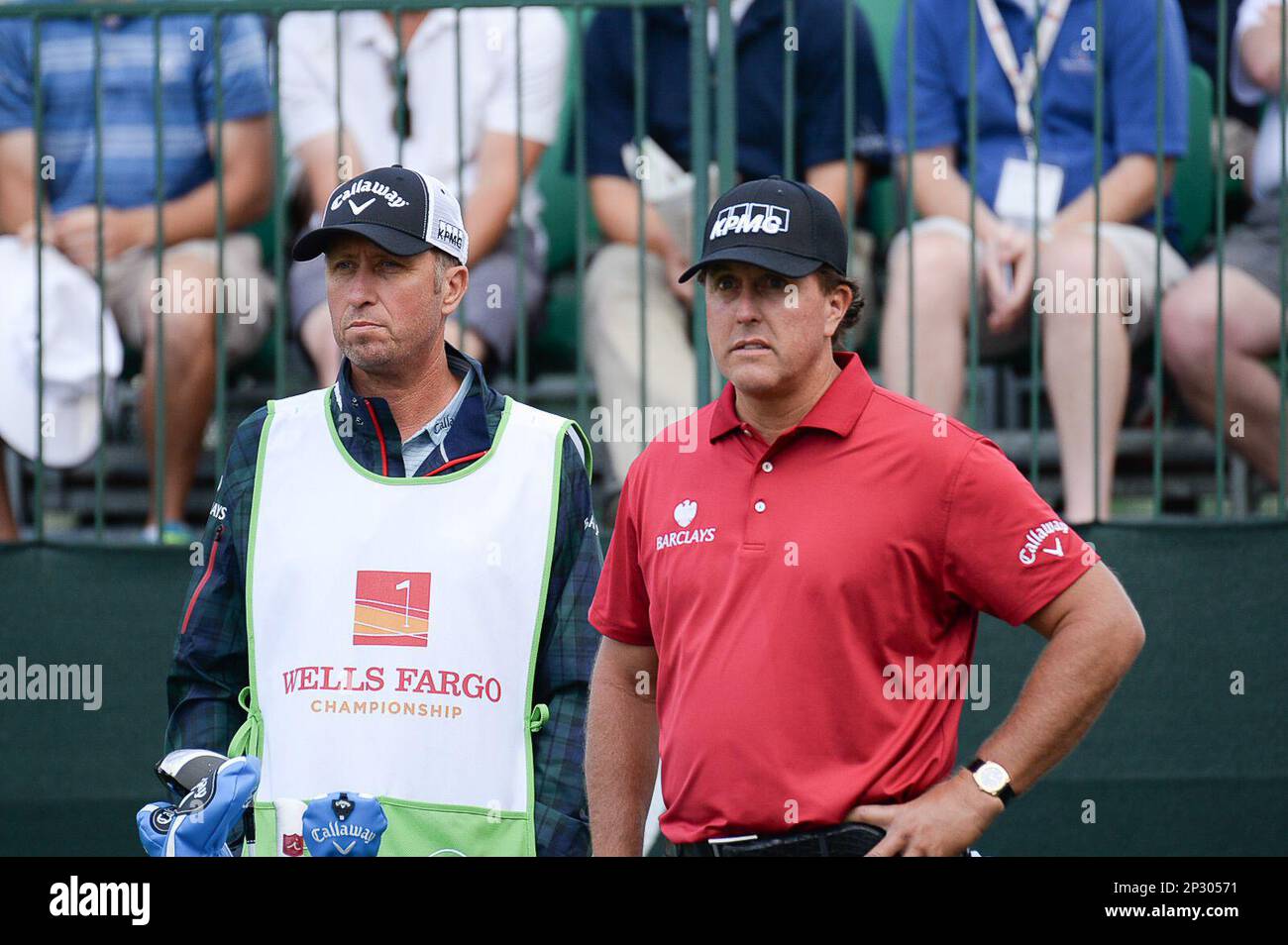 May 14, 2015: Phil Mickelson talks to his caddy, Bones, before teeing ...