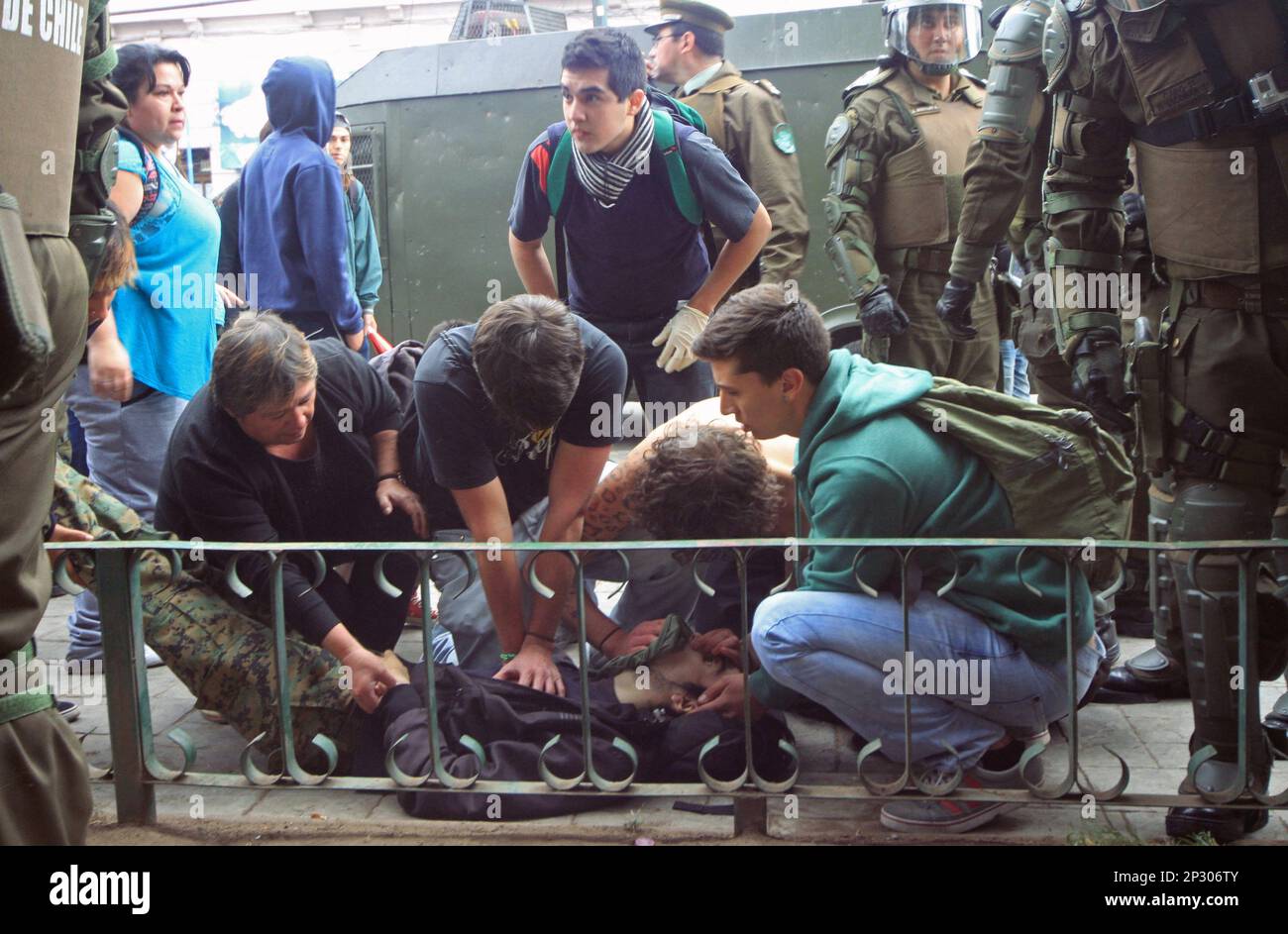 Diego Guzman, 25, is given CPR as he lies dying after being shot in