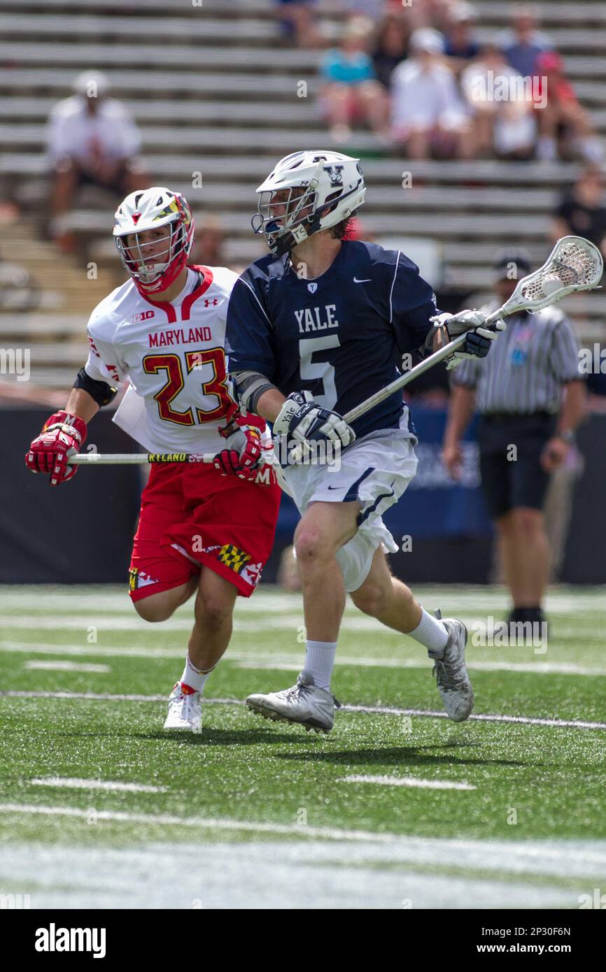 May 9, 2015: Yale Bulldogs Eric Scott (5) attempts a shot while being  defended by Maryland Terrapins Adam DiMillo (23) during the NCAA Men's  Division I Championship first round game between Yale