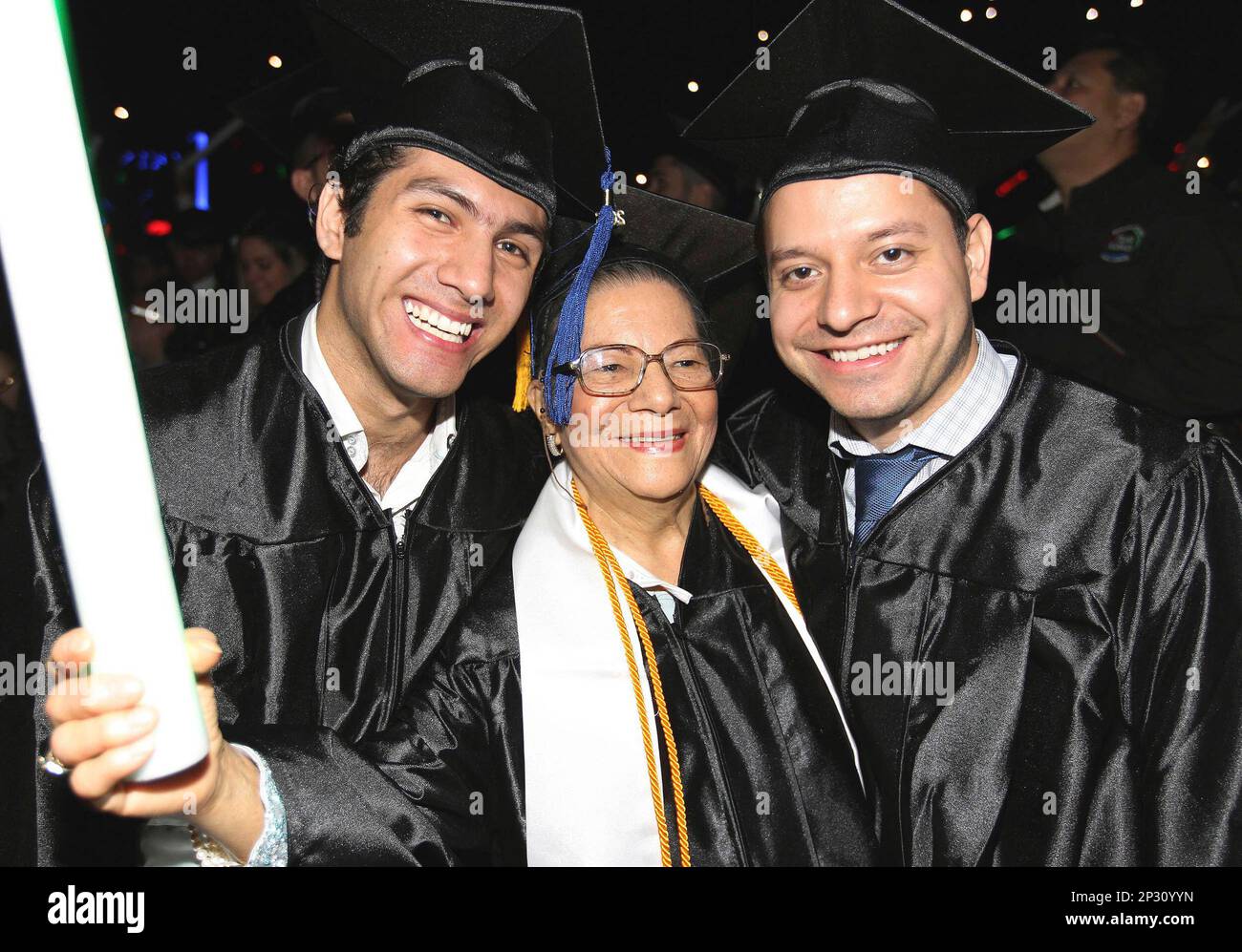 In this Saturday, May 2, 2015, photo, Rosa Elisa Salgado, center, poses