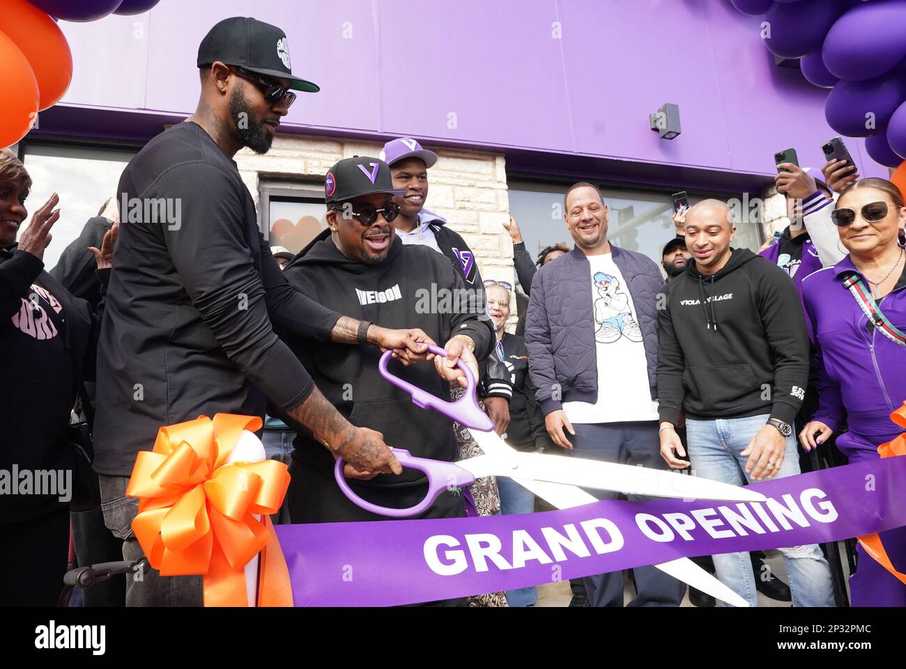 St. Louiis, United States. 04th Mar, 2023. Former professional basketball player Larry Hughes (L) prepares to cut the ribbon for the grand opening of his new store, The Viola Dispensary in St. Louis on Saturday, March 4, 2023. Hughes is opening up two medical marijuana dispensaries with the help of Allen Iverson in attendance. Photo by Bill Greenblatt/UPI Credit: UPI/Alamy Live News Stock Photo