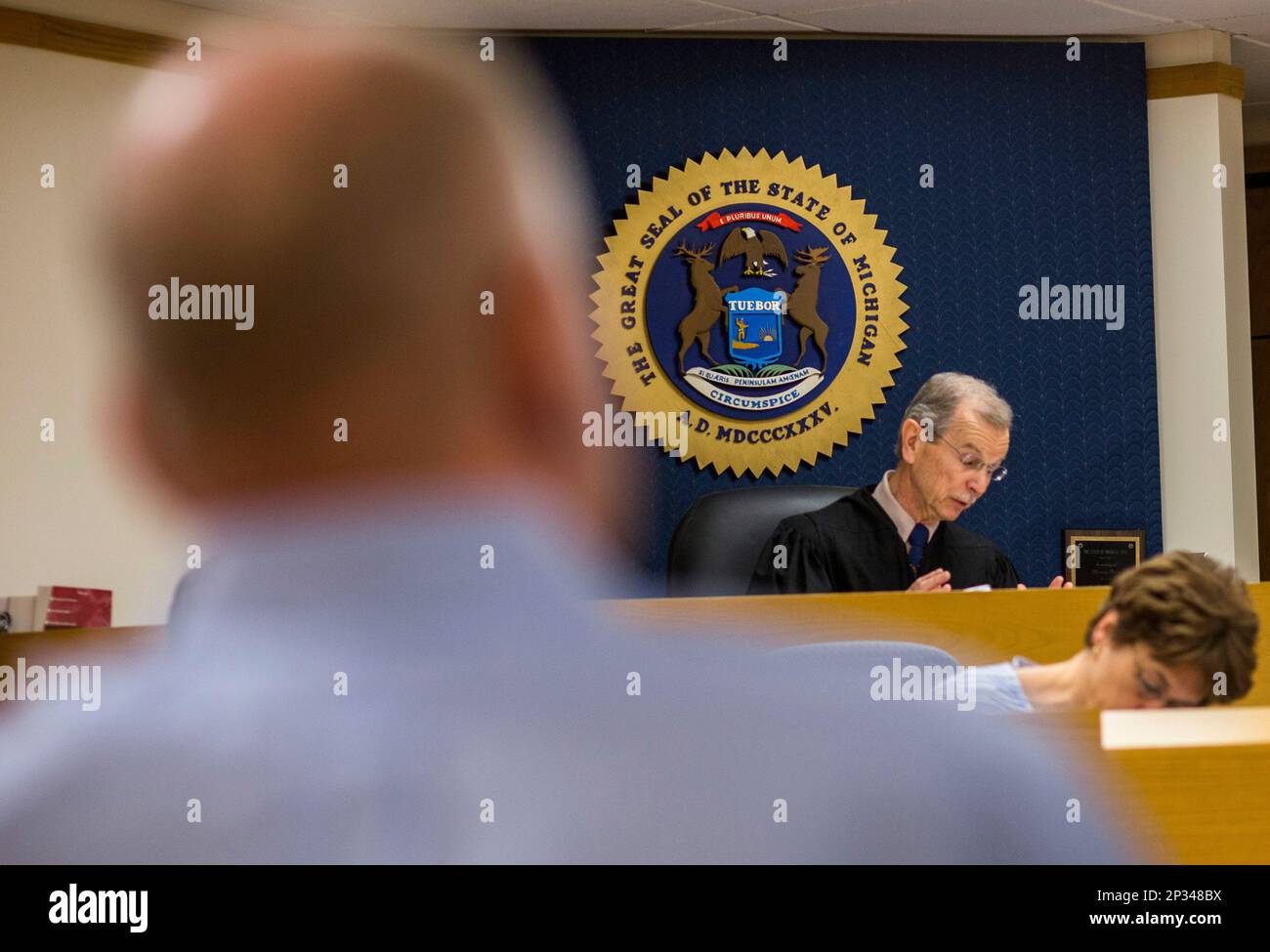 Chief Circuit Court Judge Nick Holowka oversees a plea hearing for