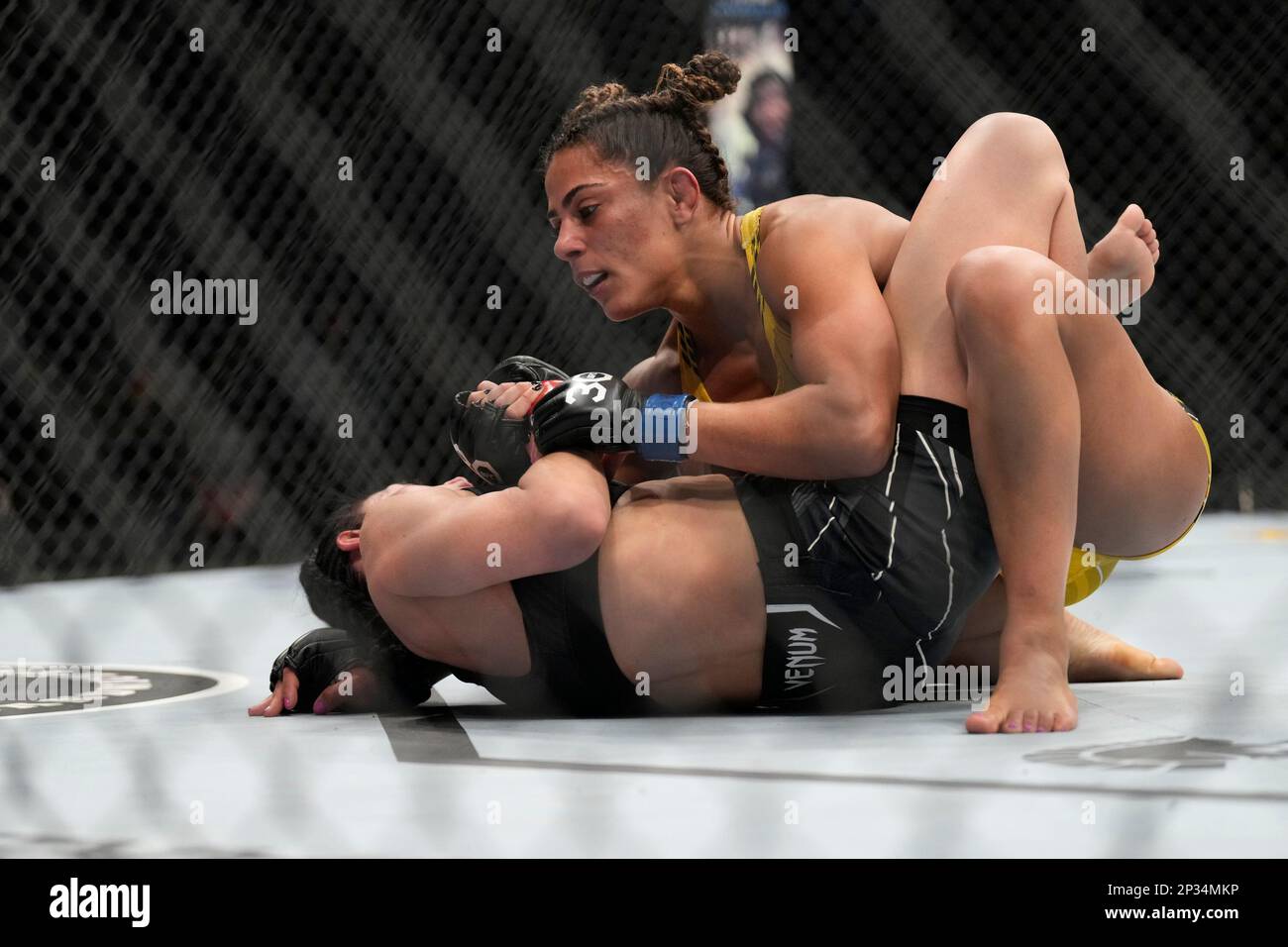 Ufc Tabitha Ricca LAS VEGAS, NV - MARCH 4: (R-L) Tabatha Ricci controls the body of ...