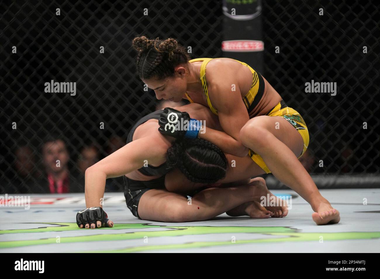 Ricca Ufc LAS VEGAS, NV - MARCH 4: Tabatha Ricci (top) controls the body of ...