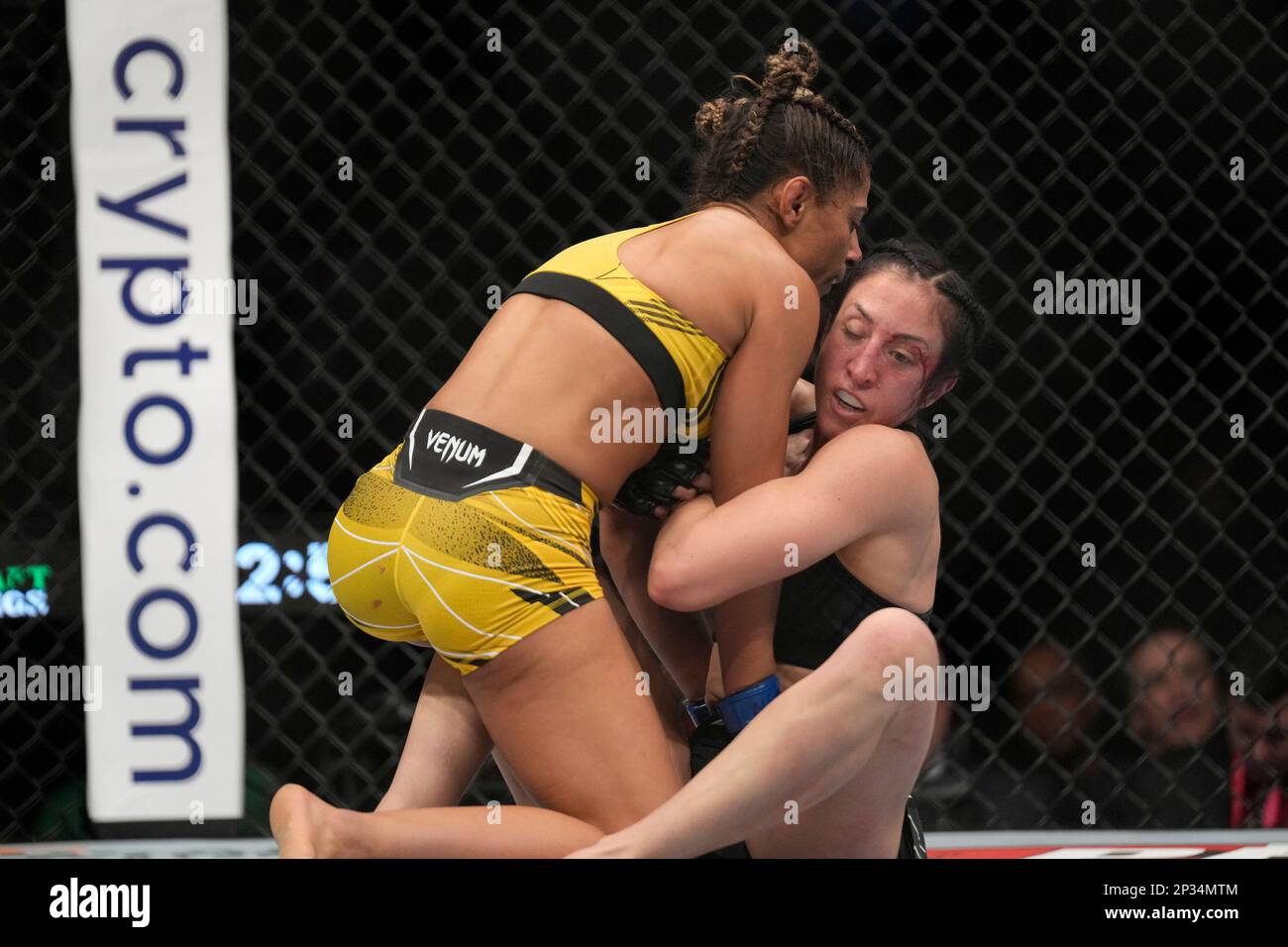 Ricca Ufc LAS VEGAS, NV - MARCH 4: Tabatha Ricci (top) controls the body of ...
