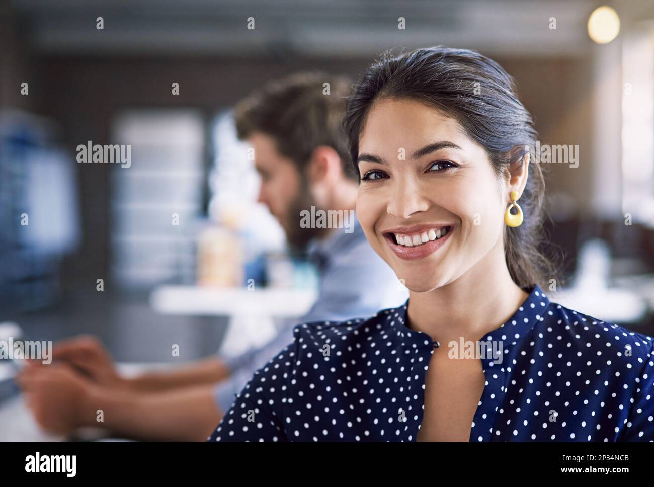 Portrait of woman in creative agency with smile, success and startup at design agency. Face of happy designer in office, Indian manager or team leader Stock Photo