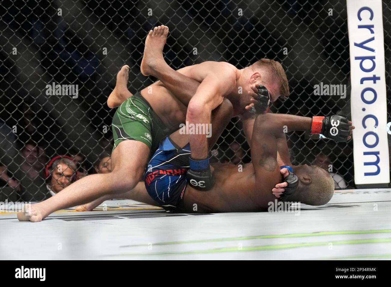 LAS VEGAS, NV MARCH 4 Derek Brunson (top) punches Dricus Du Plessis