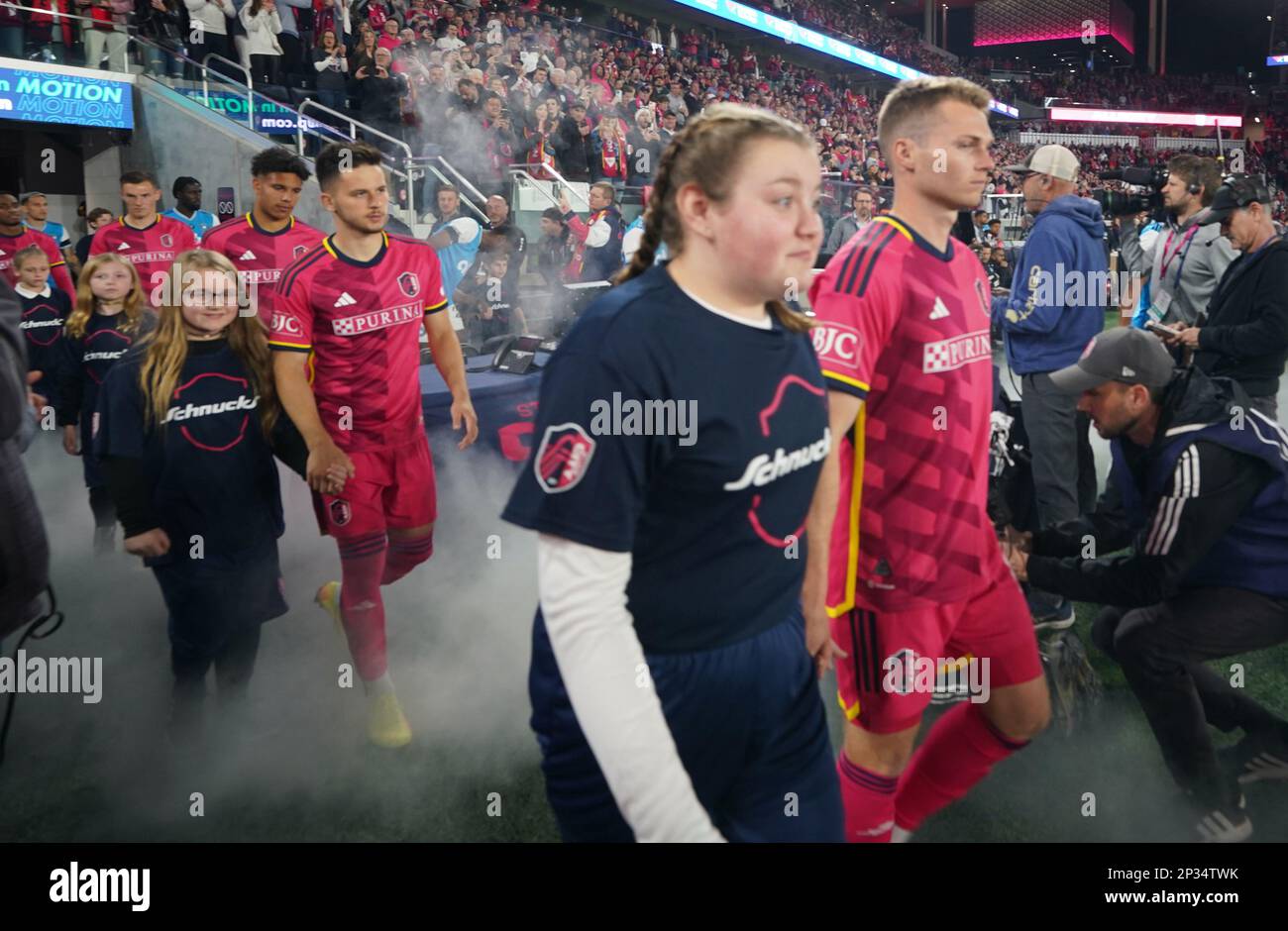 St. Louis, United States. 04th Mar, 2023. Members St. Louis City SC walk to the field with young fans for the inaugural game at the new Citypark in St. Louis on March 4, 2023. Photo by Bill Greenblatt/UPI Credit: UPI/Alamy Live News Stock Photo