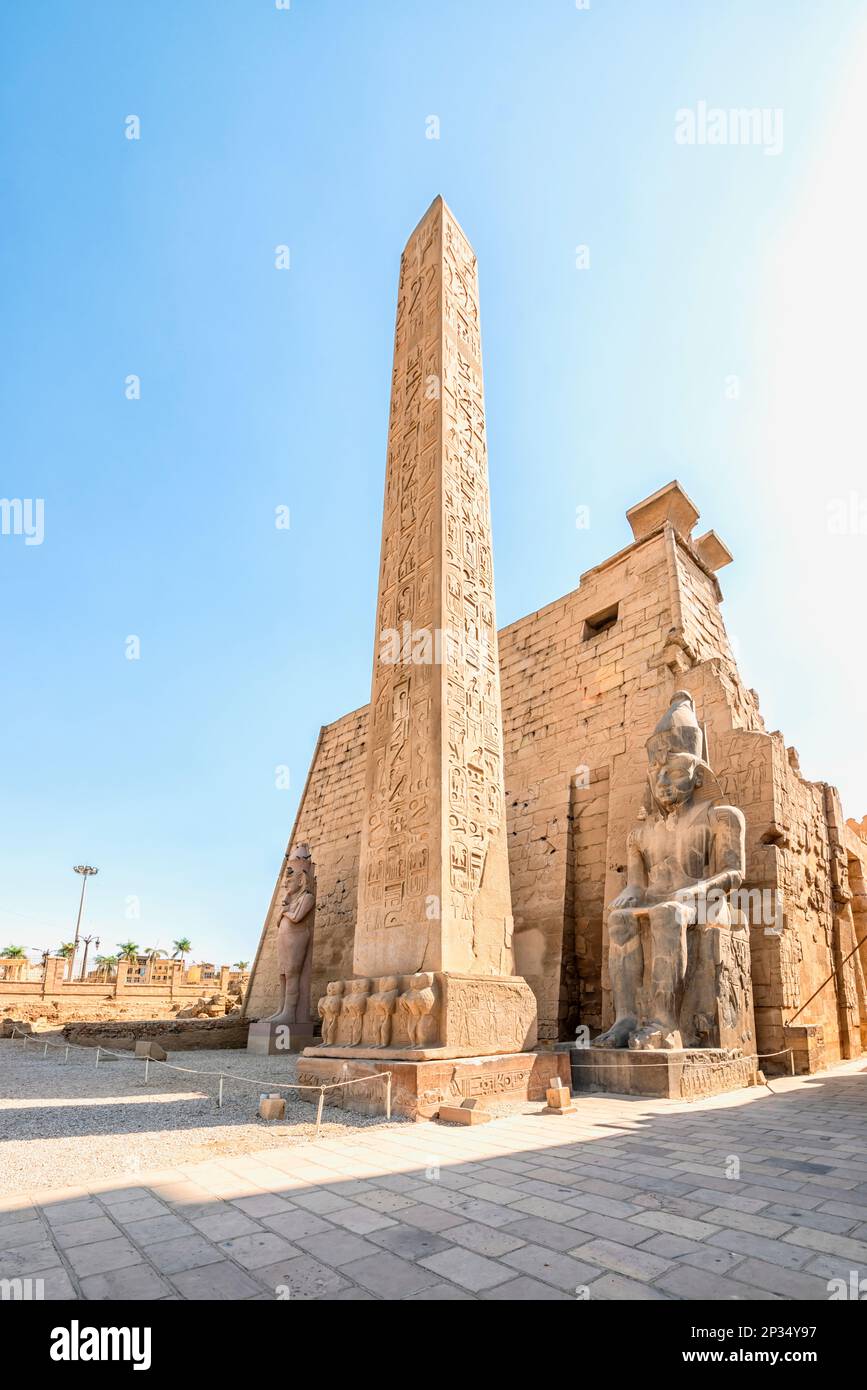 Obelisk and statue in Luxor Temple, Egypt Stock Photo