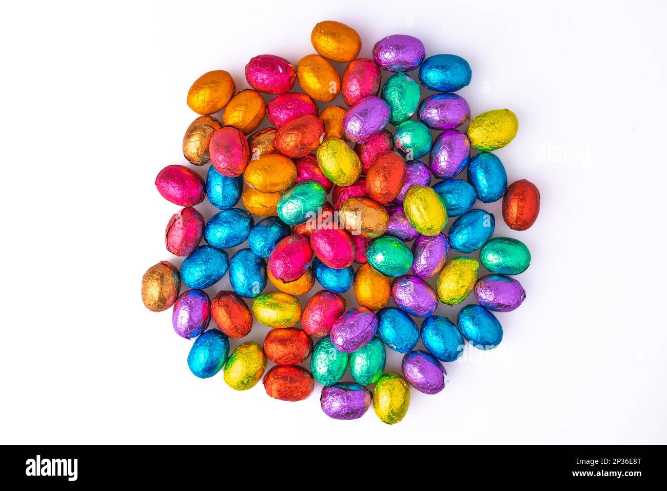 Colourful Easter sweets, chocolate eggs on a white background Stock Photo