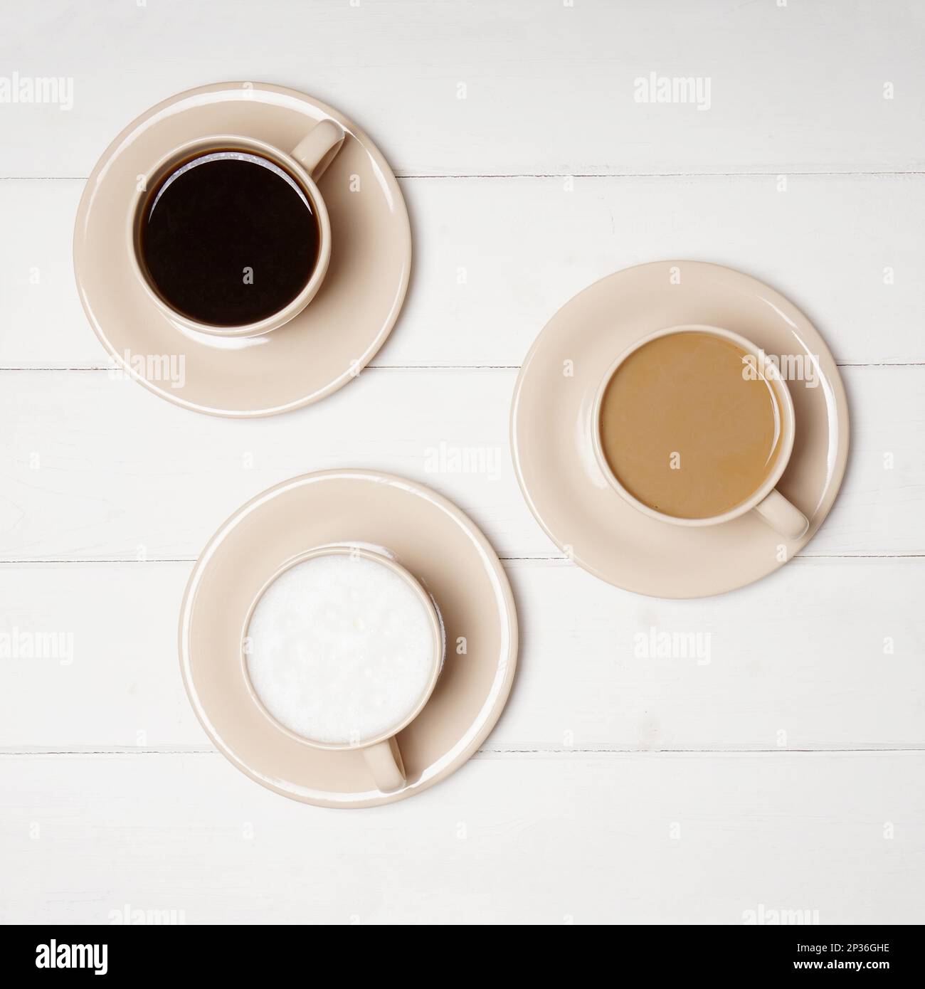 top view of selection of different coffee drinks in cups. black, flat white and cafe latte Stock Photo