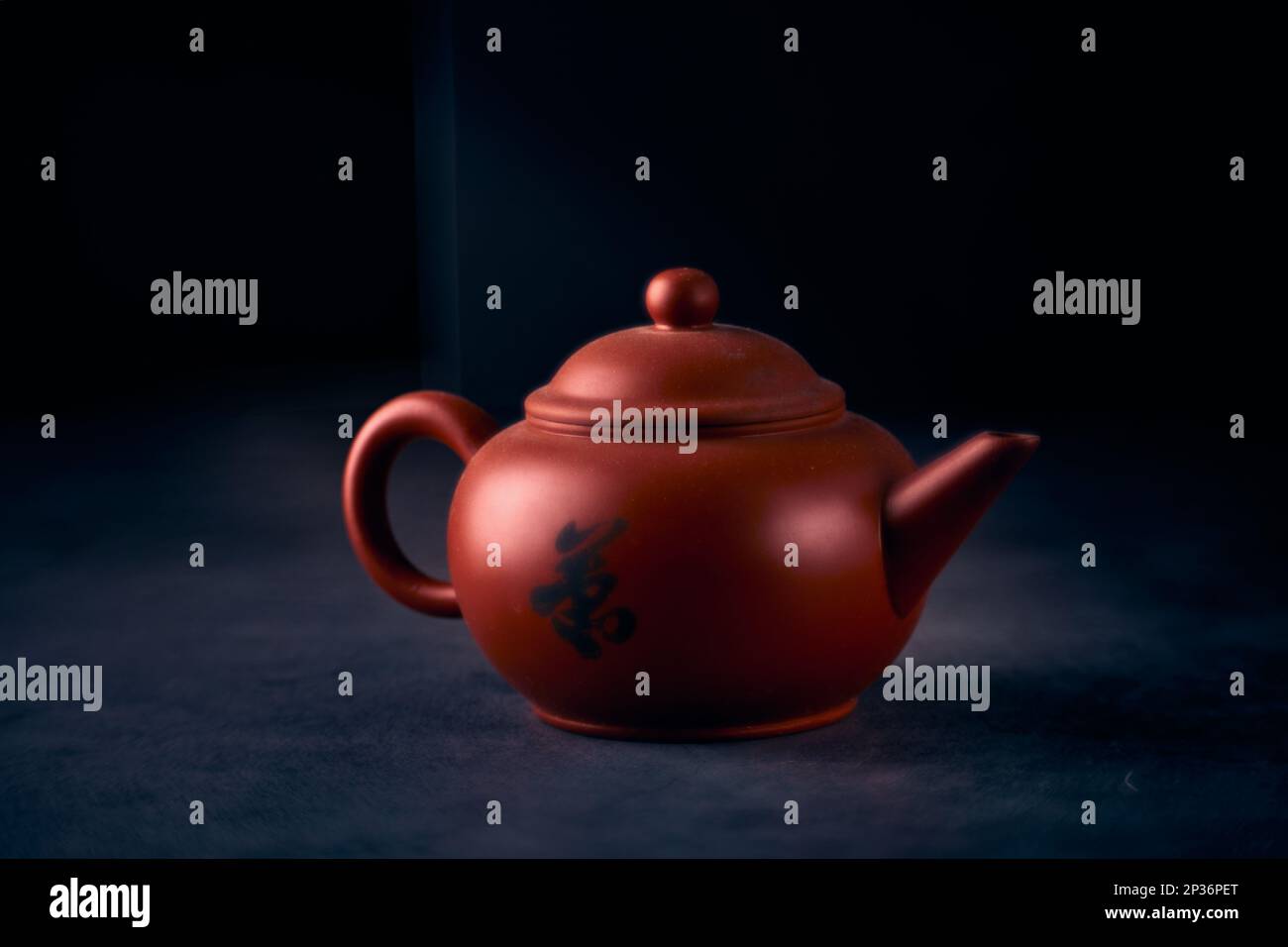 Volumetric photo of a Chinese teapot for brewing tea on a black background Stock Photo Alamy