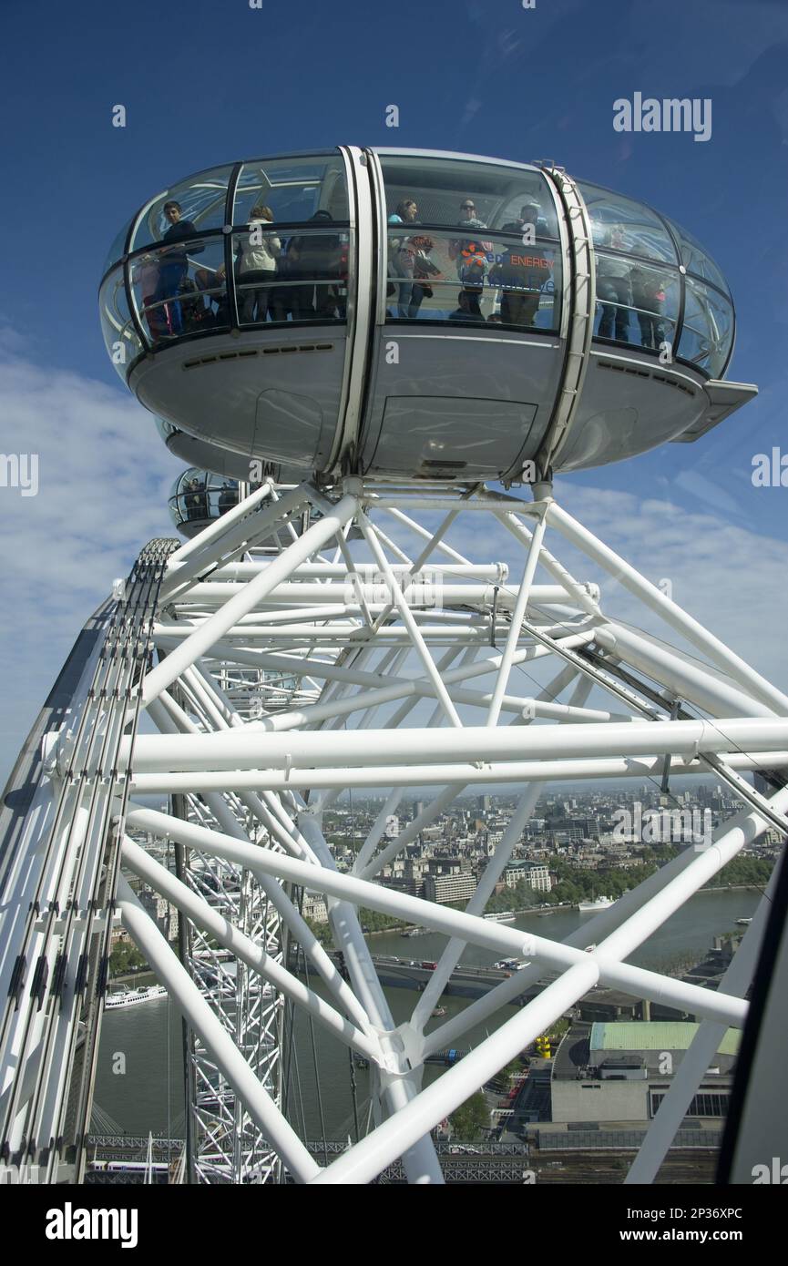 Ferris wheel passenger pods overlooking the city river, London Eye, South Bank, Thames, Lambeth, London, England, United Kingdom Stock Photo