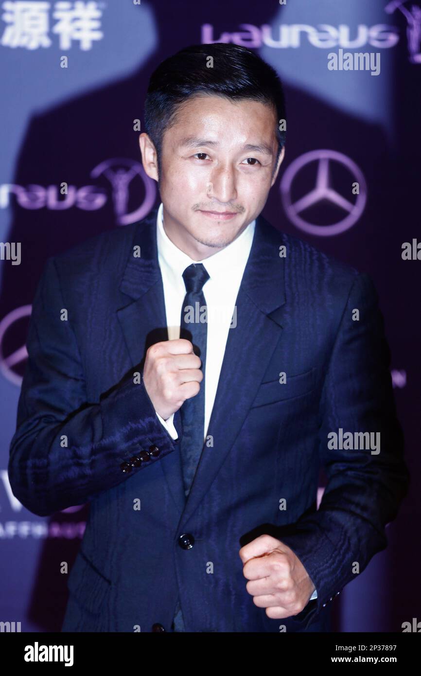 Chinese boxer Zou Shiming poses on the red carpet for the 2015 Laureus