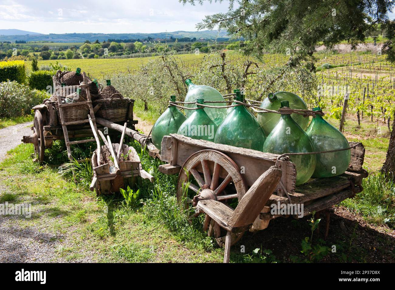 Wooden cart with wine bottles, Villa A Sesta, Chianti, Tuscany, Italy Stock Photo