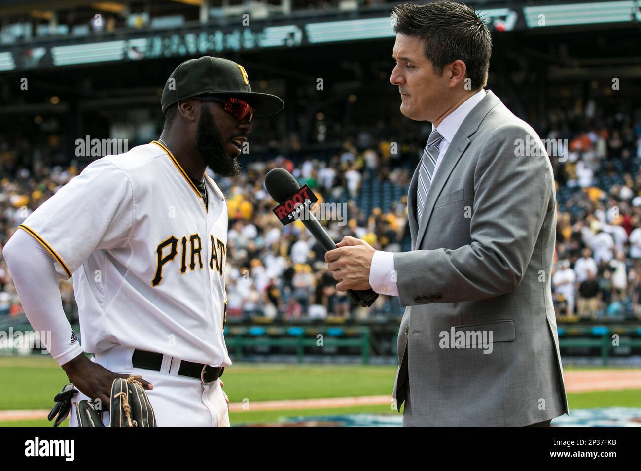 April 13 2015: Pittsburgh Pirates Infield Josh Harrison (5) is interviewed  by Rob King from Root Sports after the Opening Day game between the Detroit  Tigers and Pittsburgh Pirates at PNC Park