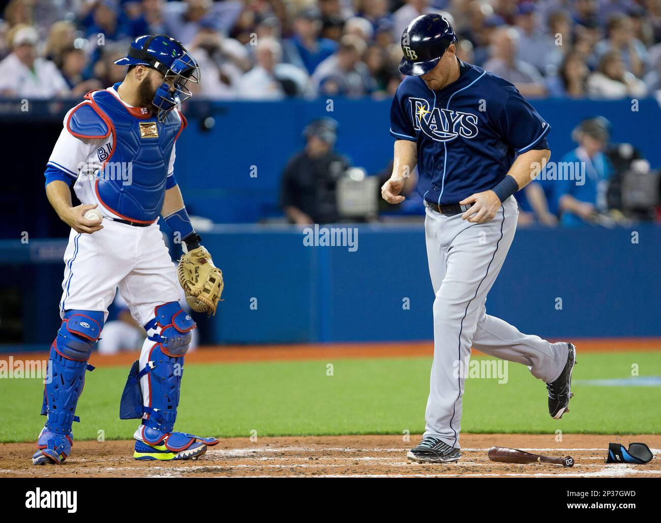 Toronto Blue Jays catcher Russell Martin watches as Tampa Bay Rays
