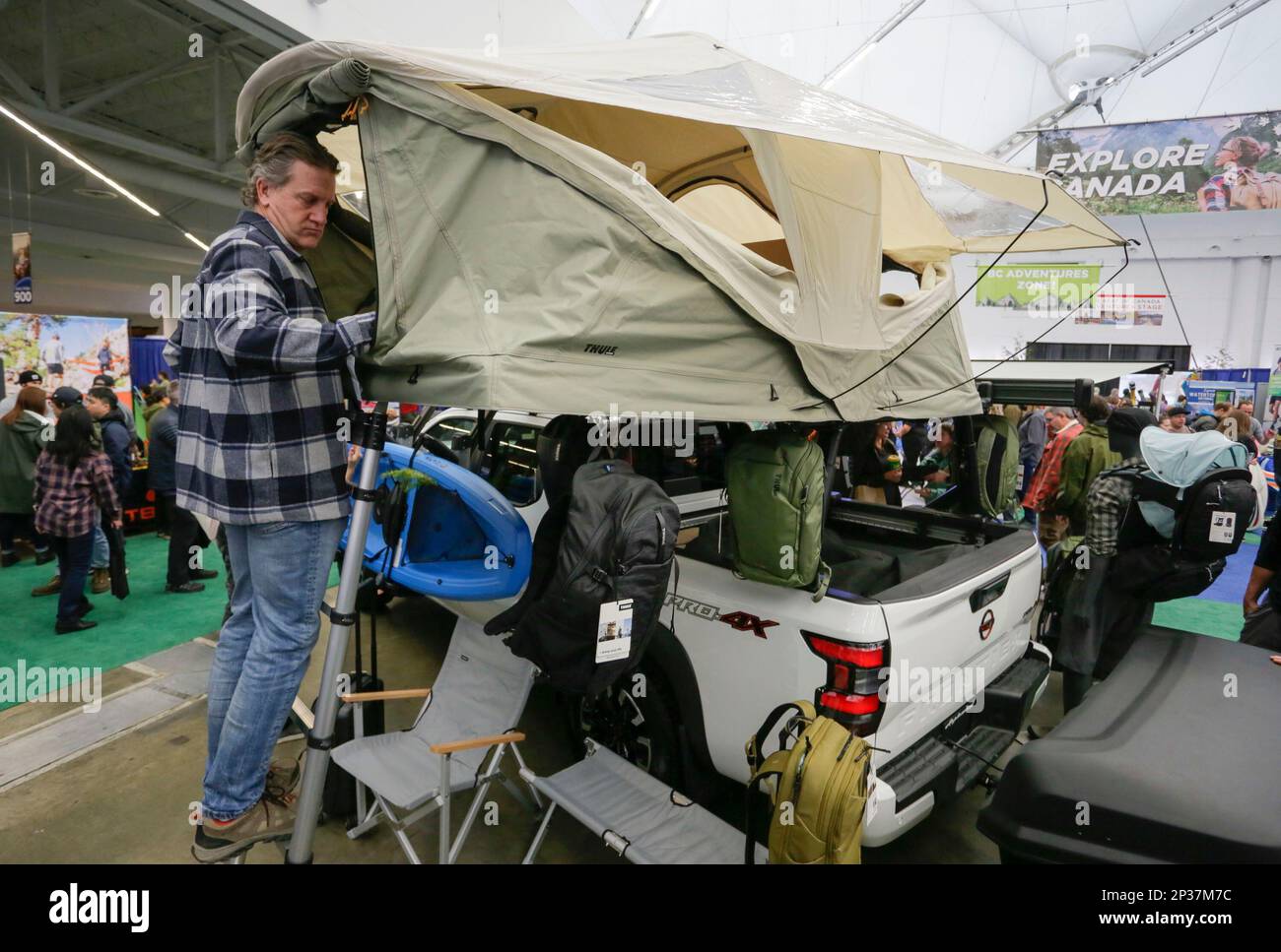 Vancouver, Canada. 4th Mar, 2023. A visitor looks at camping equipment