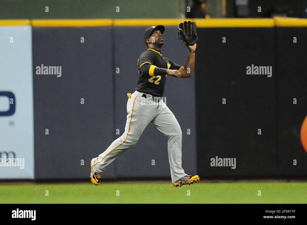 MILWAUKEE, WI - JULY 05: Milwaukee Brewers designated hitter Jesse Winker  (33) places the home run cheesehead on Milwaukee Brewers shortstop Willy  Adames (27) during a game between the Milwaukee Brewers and