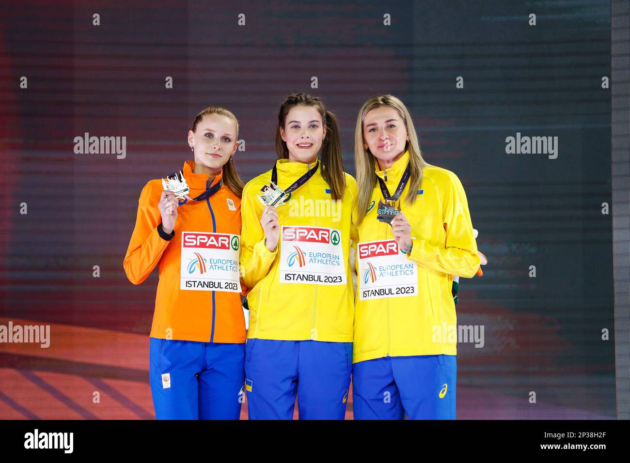 ISTANBUL, TURKEY - MARCH 5: Britt Weerman of the Netherlands, Yaroslava Mahuchikh of Ukraine and Kateryna Tabashnyk of Ukraine during the podium ceremony after competing in the High Jump Women during Day 3 of the European Athletics Indoor Championships at the Atakoy Athletics Arena on March 5, 2023 in Istanbul, Turkey (Photo by Nikola Krstic/BSR Agency) Stock Photo