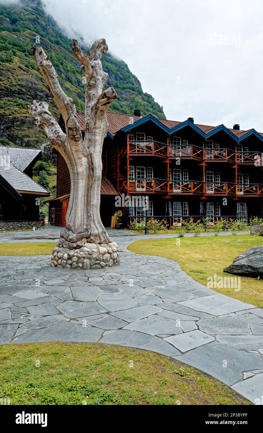 Travel destination north of Europe: Wooden carving in front of Flamsbrygga Hotel in the village of Flam at the southern end of Aurlandsfjorden western Stock Photo