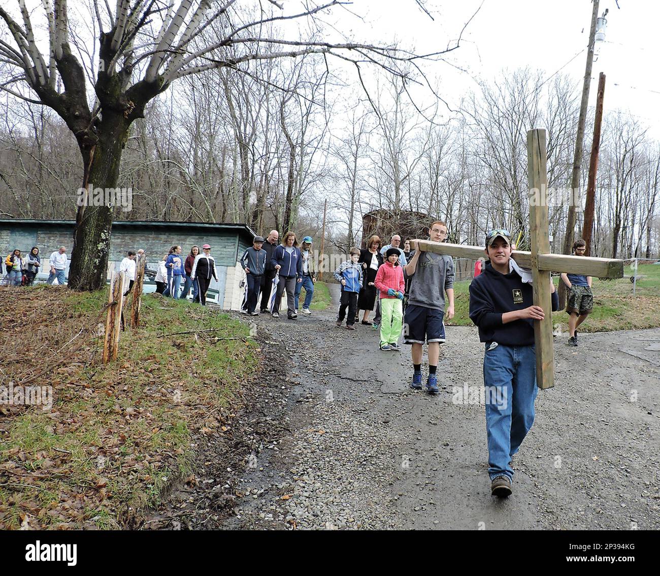 Zachary King leads the procession of the cross from Good Hope Baptist