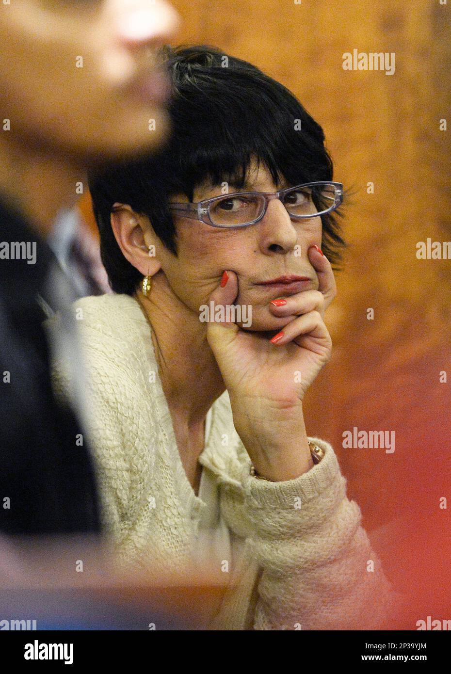 Terri Hernandez Listens During The Murder Trial Of Her Son, Former New