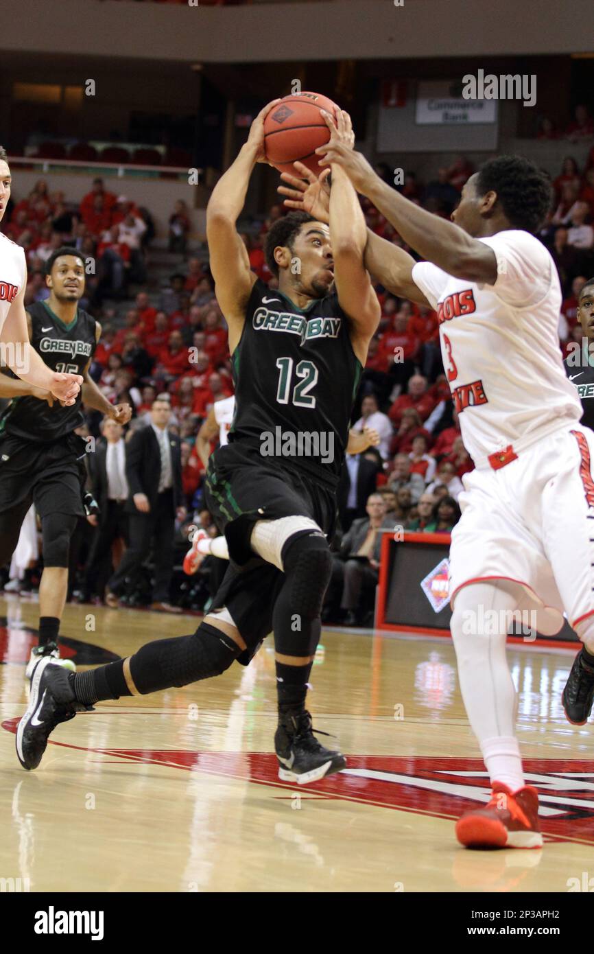 18 March 2015: Daishon Knight goes after the ball being carried by  Carrington Love during an NIT men's basketball game between the Green Bay  Phoenix and the Illinois State Redbirds at Redbird