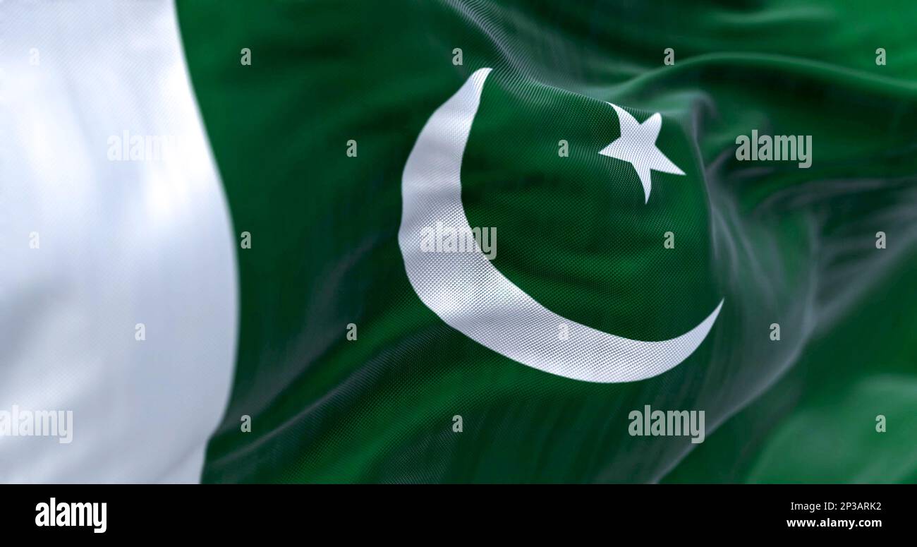Detail of of Pakistan National flag waving. Green with white band on hoist; white crescent moon and five-pointed star. 3d illustration render. Selecti Stock Photo
