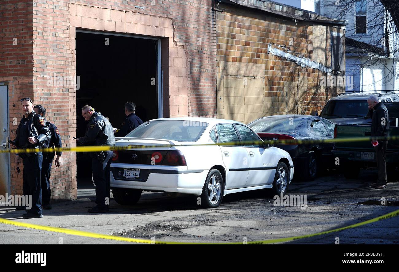 The Kenosha Police Department investigates the scene of a shooting, Sunday, March 15, 2015 in