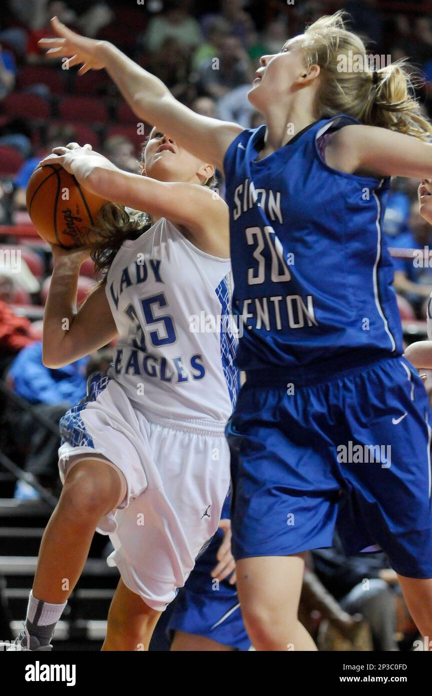 Graves County's Bailey Hawkins (35) shoots against Simon Kenton's Megan