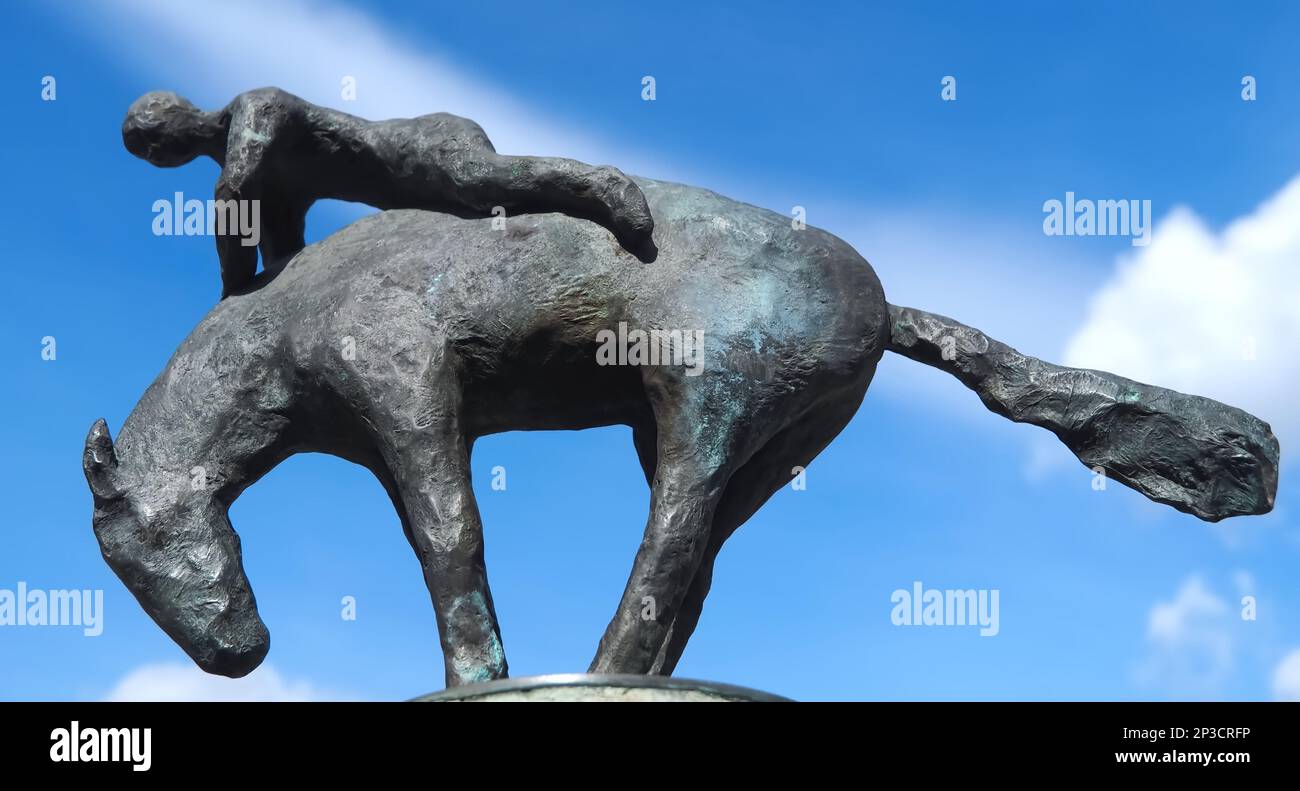 sculpture of a rodeo rider horse and person Stock Photo