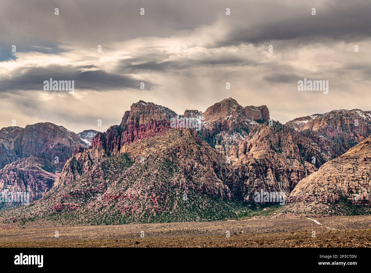 A beautiful, arid, rugged and mountainous scene in the wilderness of Red Rock Canyon in Las Vegas, Nevada, where families travel. Stock Photo