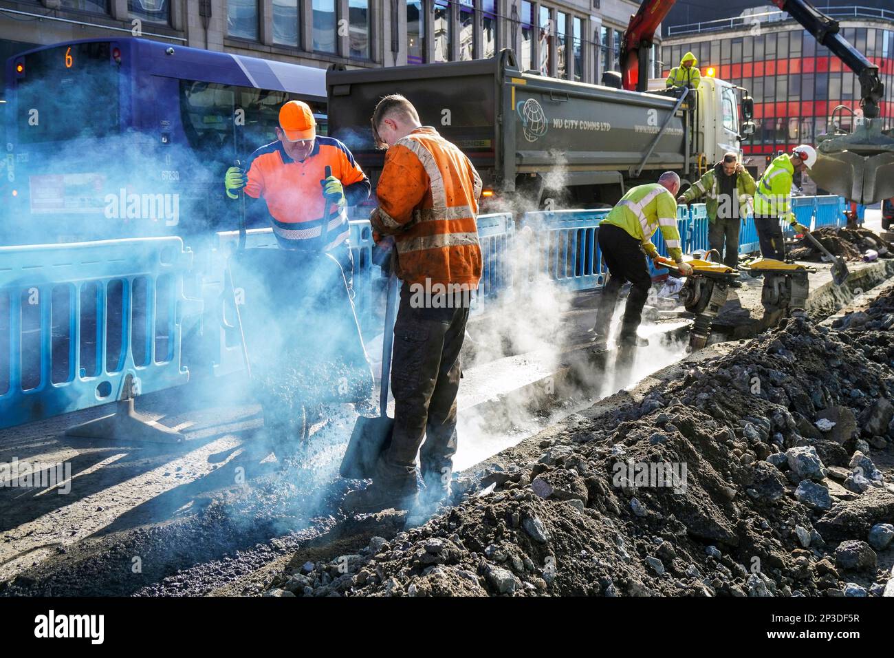 Workmen repairing the roads in Glasgow city centre, Glasgow, Scotland