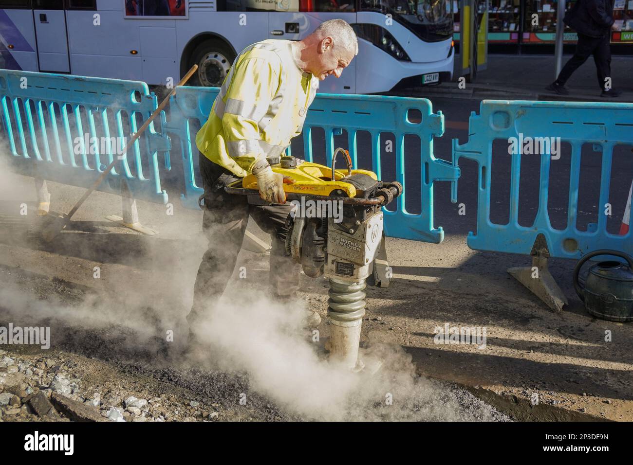 Workmen repairing the roads in Glasgow city centre, Glasgow, Scotland