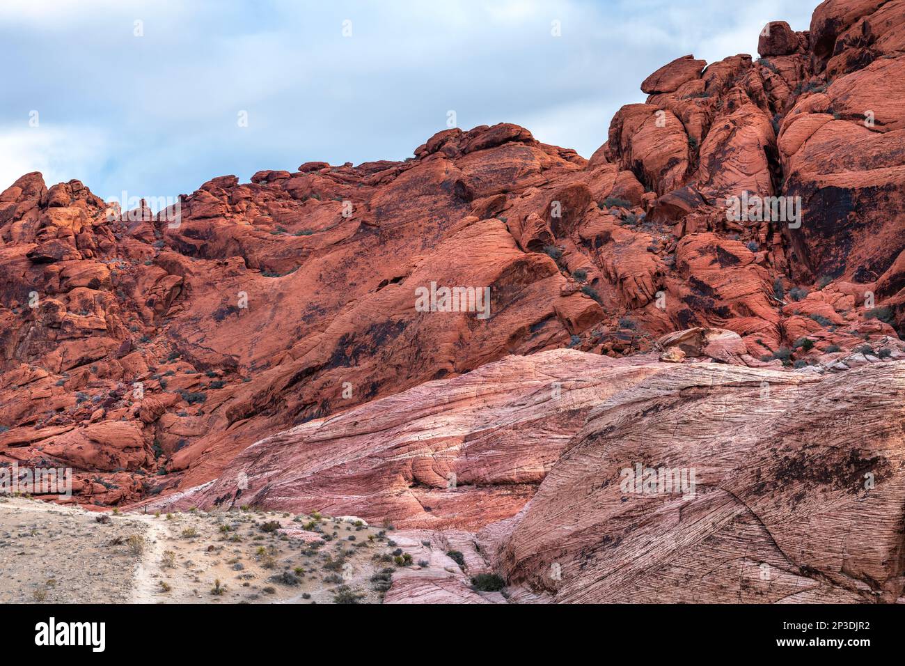 A beautiful, arid, rugged and mountainous scene in the wilderness of Red Rock Canyon in Las Vegas, Nevada, where families go for adventure. Stock Photo