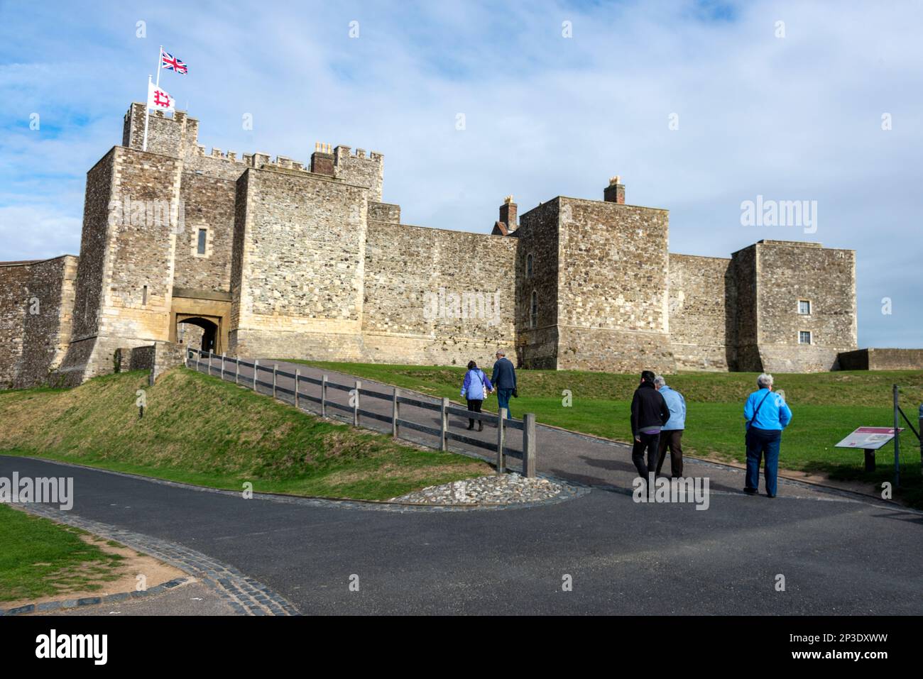 Visitors walking up the pathway leading up to Palace Gate, the main