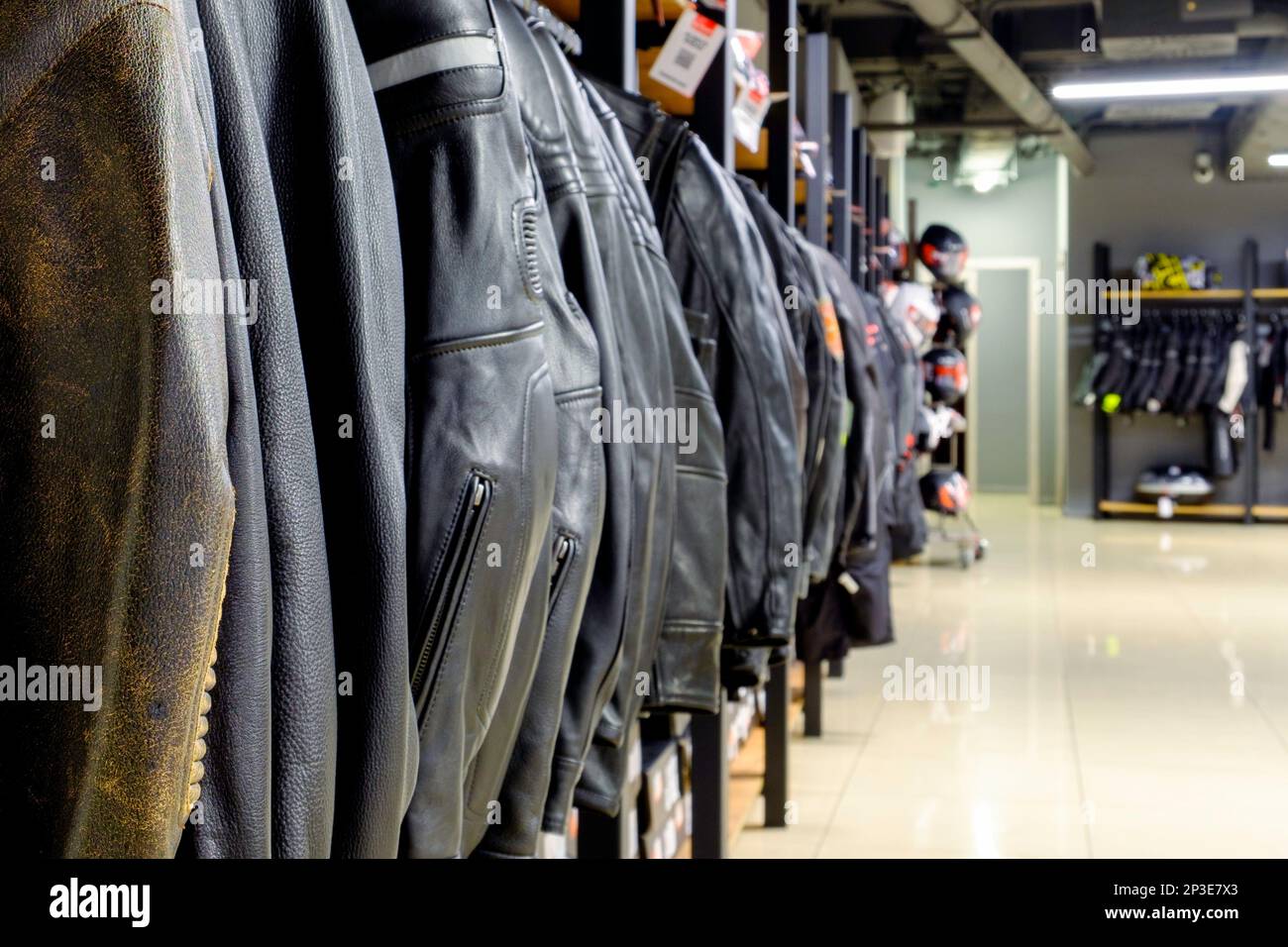 Leather motorbike jackets in a row Stock Photo