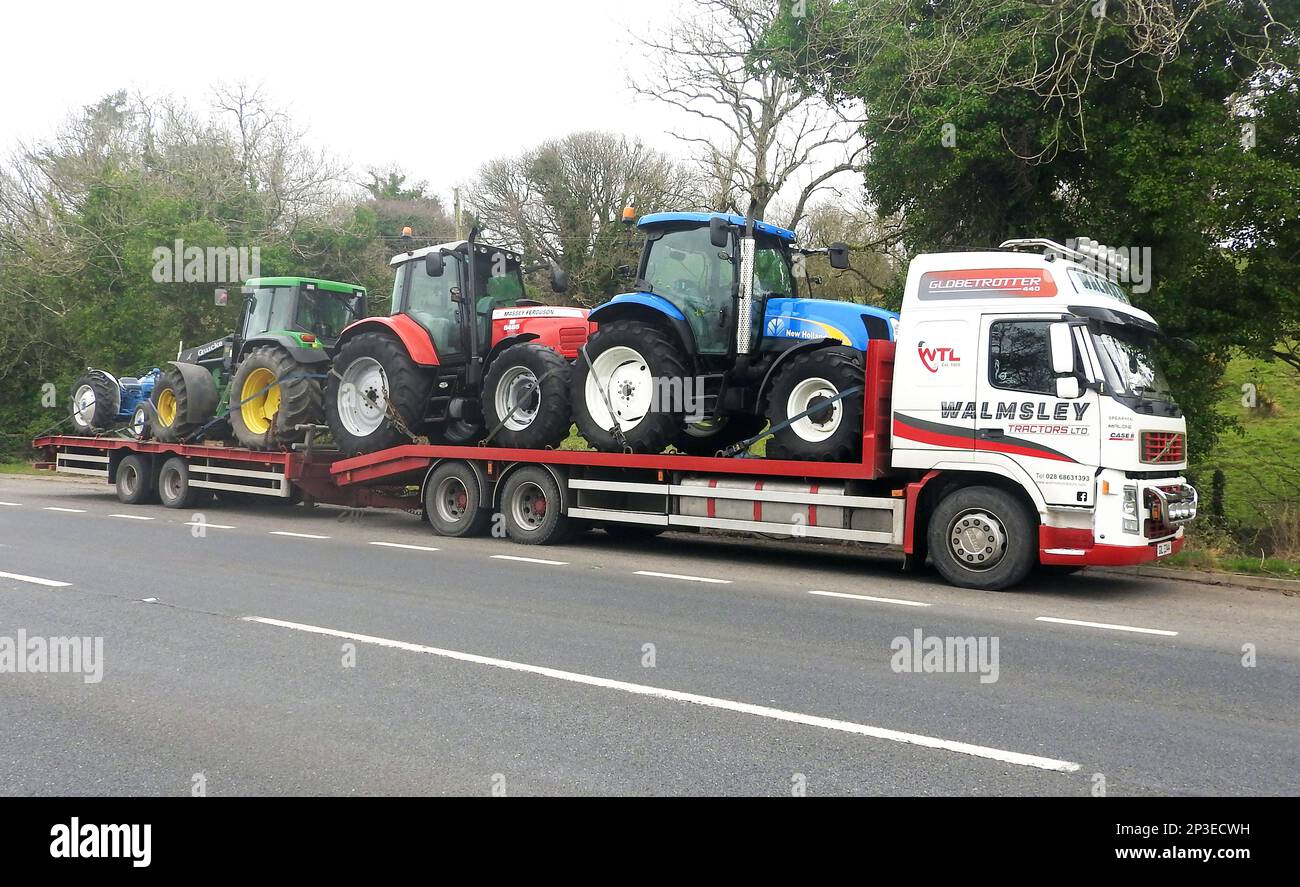 A fully loaded Walmsley Tractors, Volvo Globe Trotter  low loader with trailer parked in  a layby on the  A75 Scotland Stock Photo