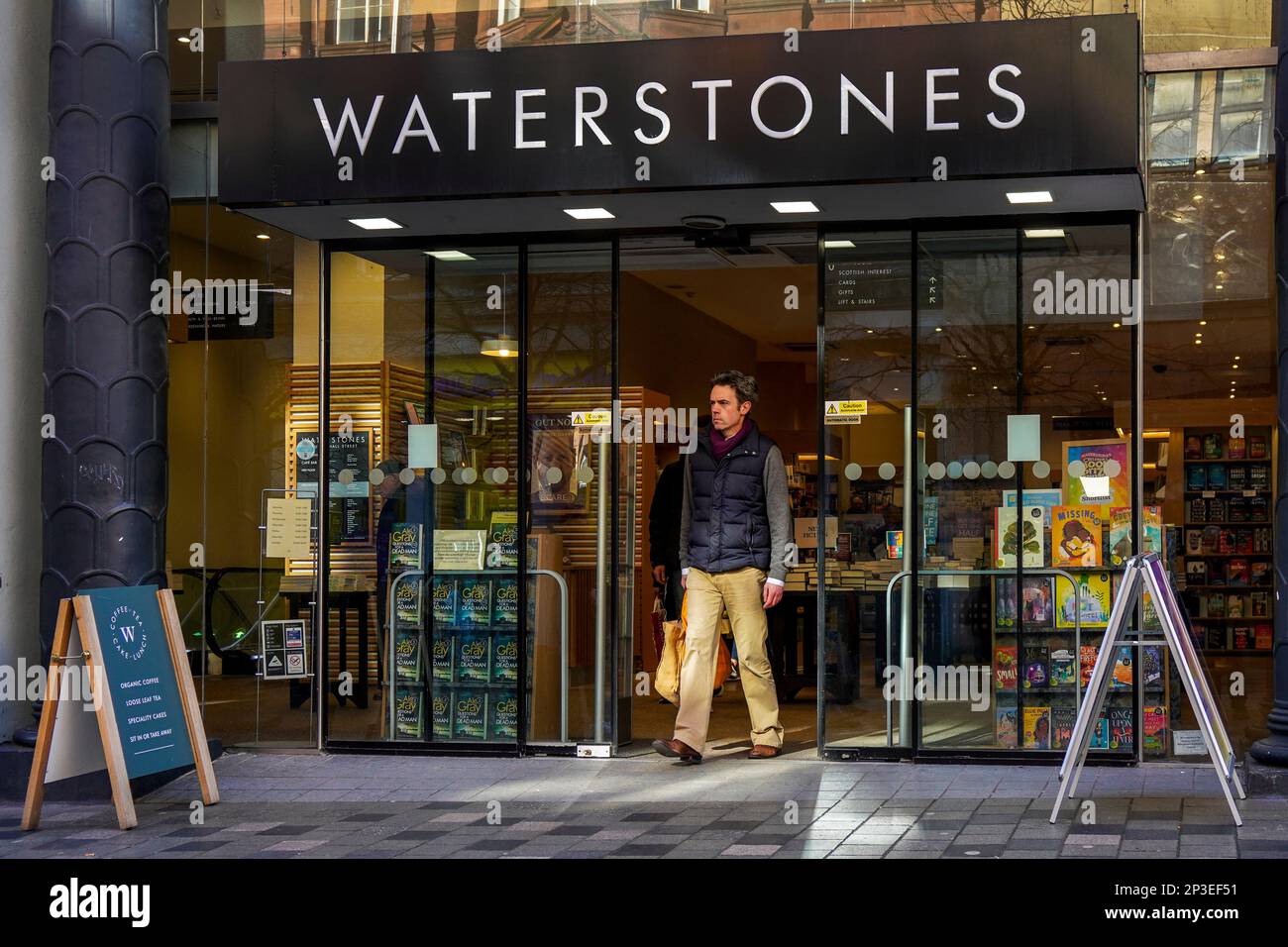 Entrance to Waterstones book shop with a customer leaving, Sauchiehall