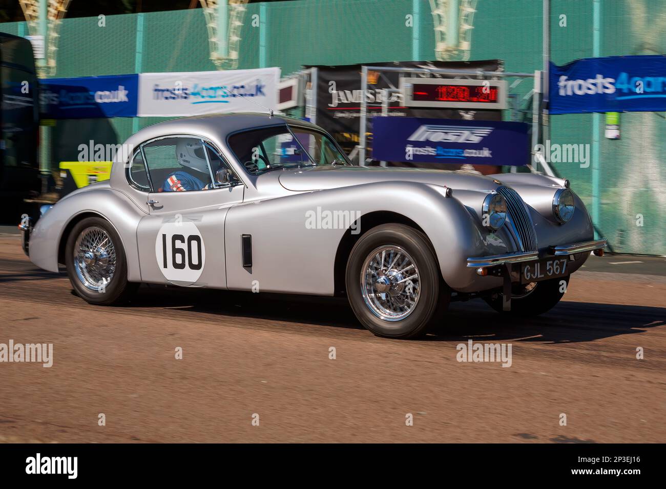 Brian Tyrer driving a Jaguar XK120 1954 at The Brighton National Speed Trials 2018. This is the oldest motor racing event in the UK and is held in the south east coastal town of Brighton. Madeira drive is a road which runs along the seafront and is normal full of people explorer the beach, pier and local attractions. Today it is turned in to a 1/4 time trial course. 1st September 2018 Stock Photo