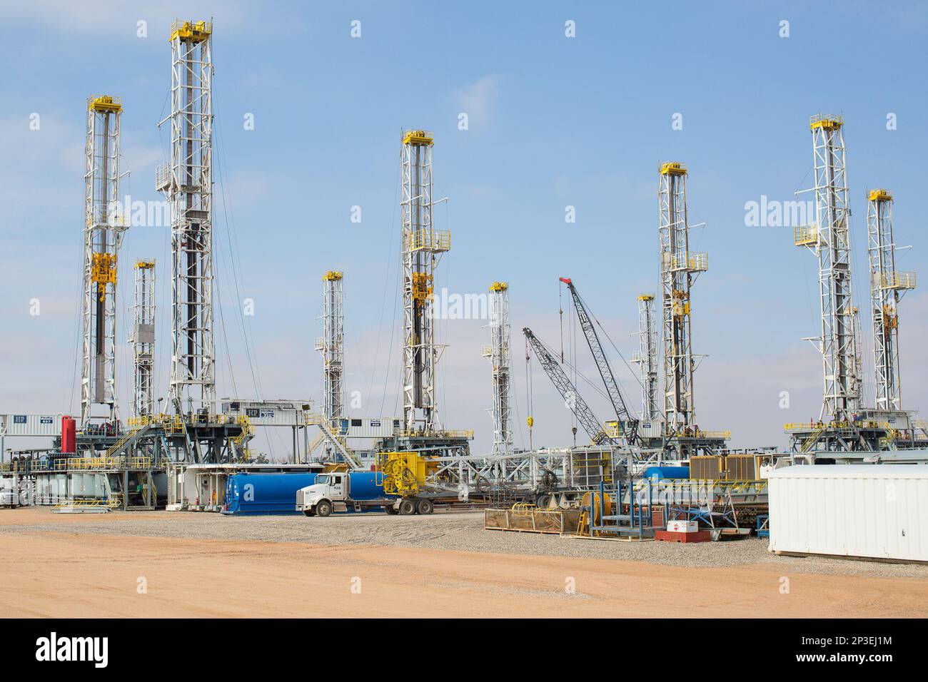 Over a dozen oil drilling rigs sit idle in a Helmerich & Payne, Inc