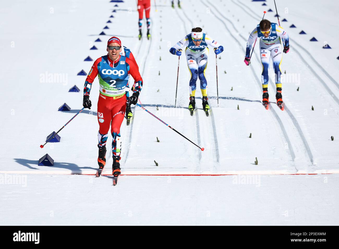 Planica, Slovenia. 05th Mar, 2023. Nordic skiing: World Championship, cross-country skiing - 50 km classic, men. Paal Golberg from Norway (l) is the first to cross the finish line. Credit: Daniel Karmann/dpa/Alamy Live News Stock Photo