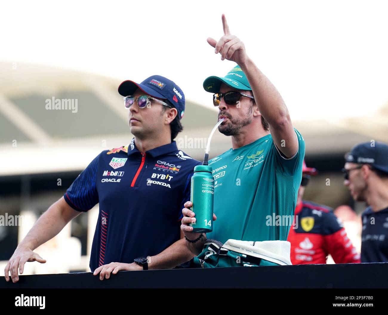 Red Bull's Sergio Perez (left) and Aston Martin's Fernando Alonso ...